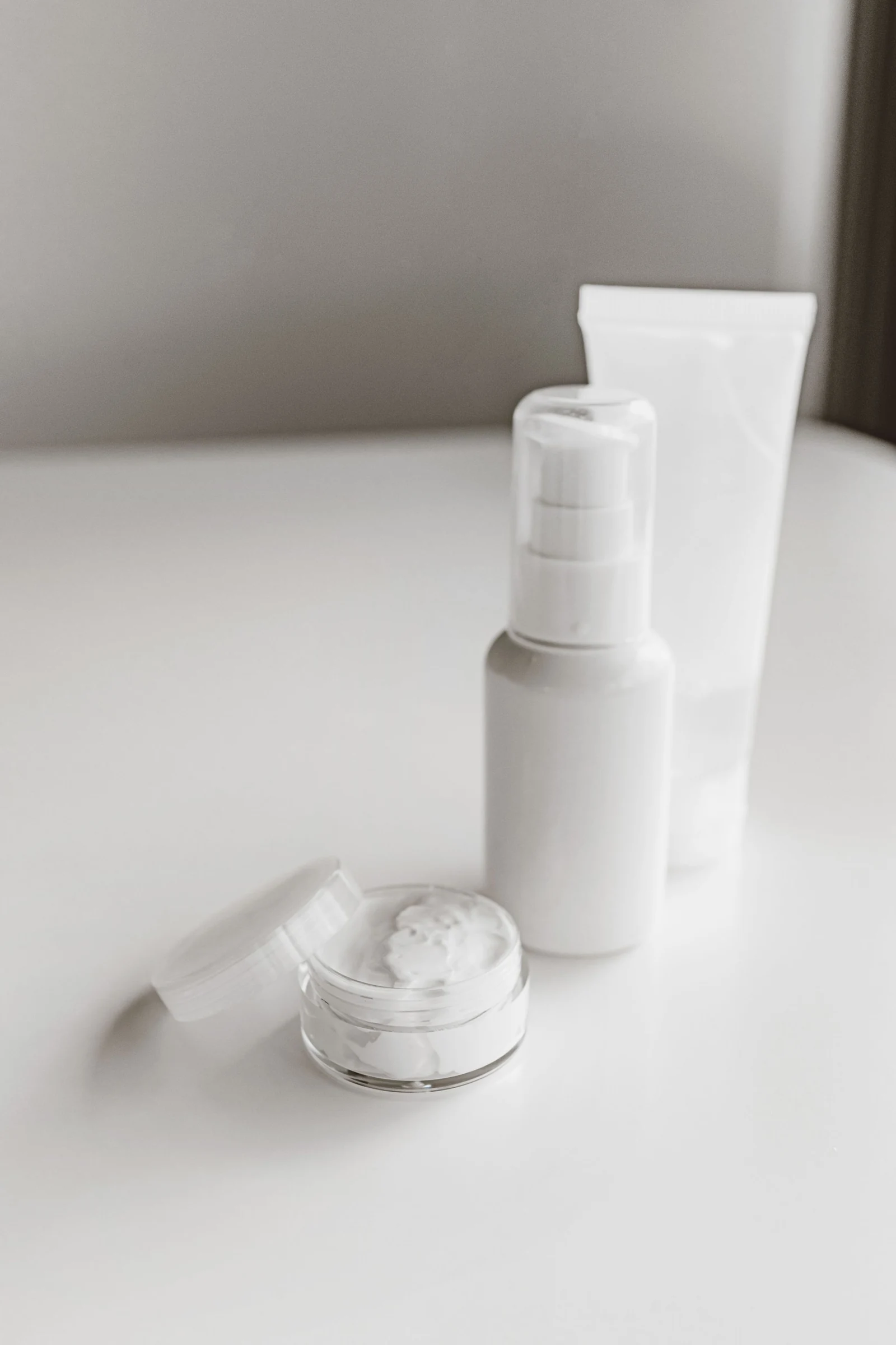 A curated arrangement of neutral skincare containers